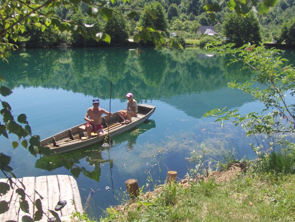 Two of us out on the Una river in a wooden boat